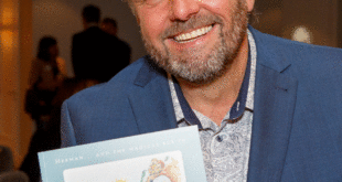 Martin Roberts with his Childrens book Sadsville in support of the NSPCC Basil Brush and Martin Roberts team up to help kids in lockdown