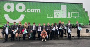 Class photo Wrexham school pupils win tour of AO recycling plant