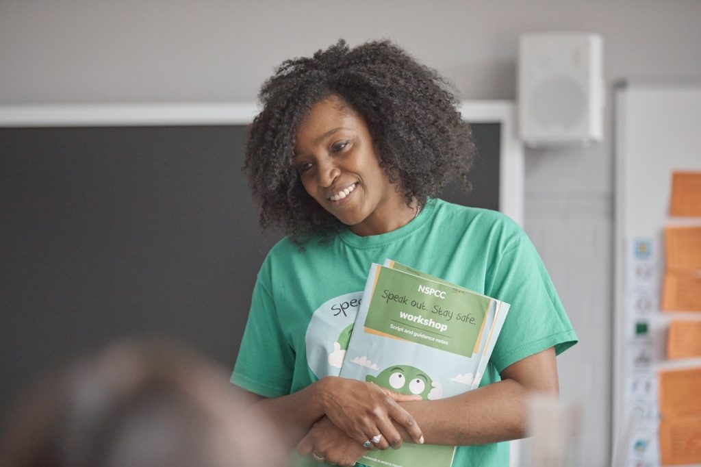 The adult pictured is a volunteer.